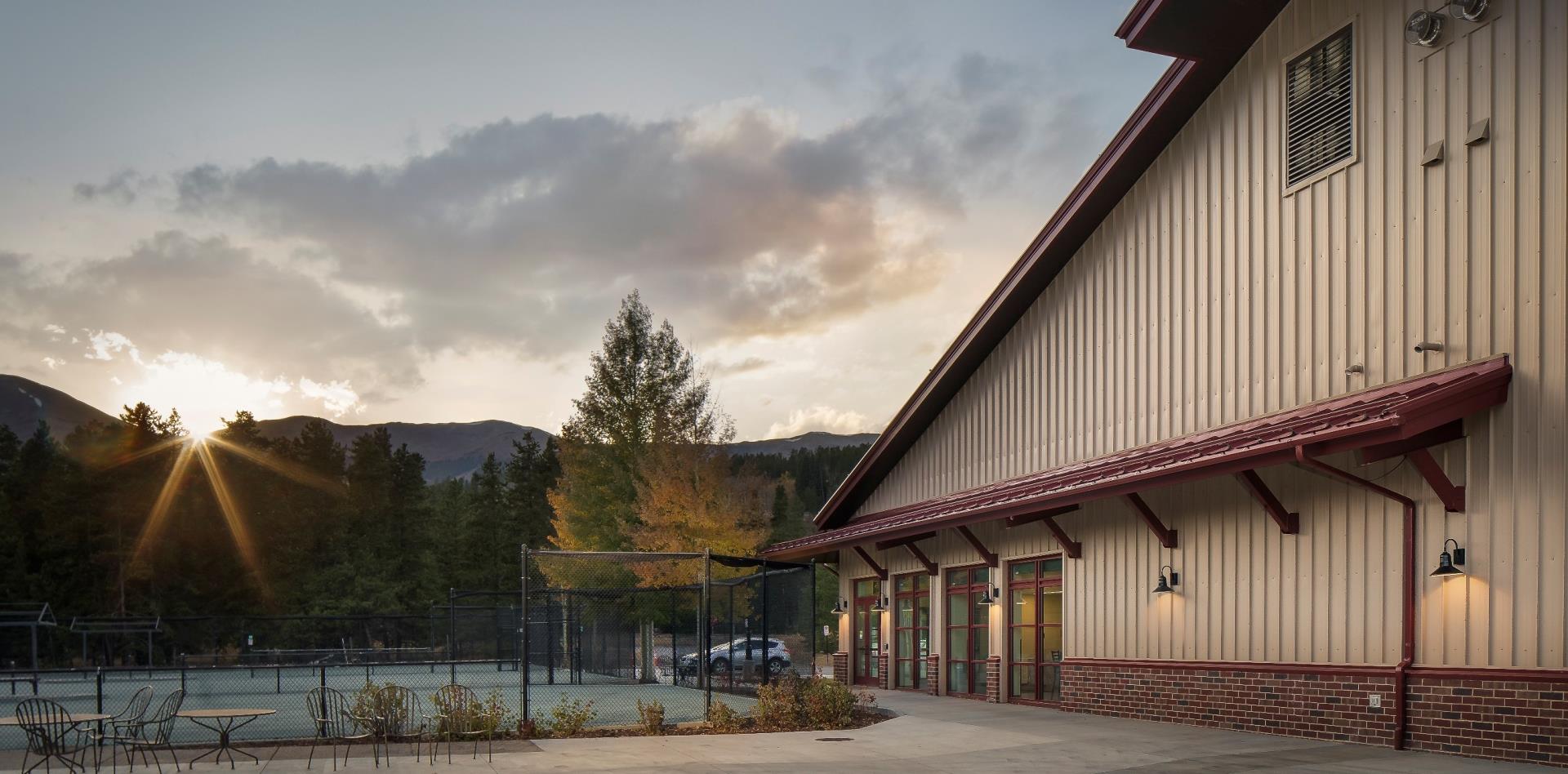 Exterior of Breckenridge Tennis Center in late afternoon