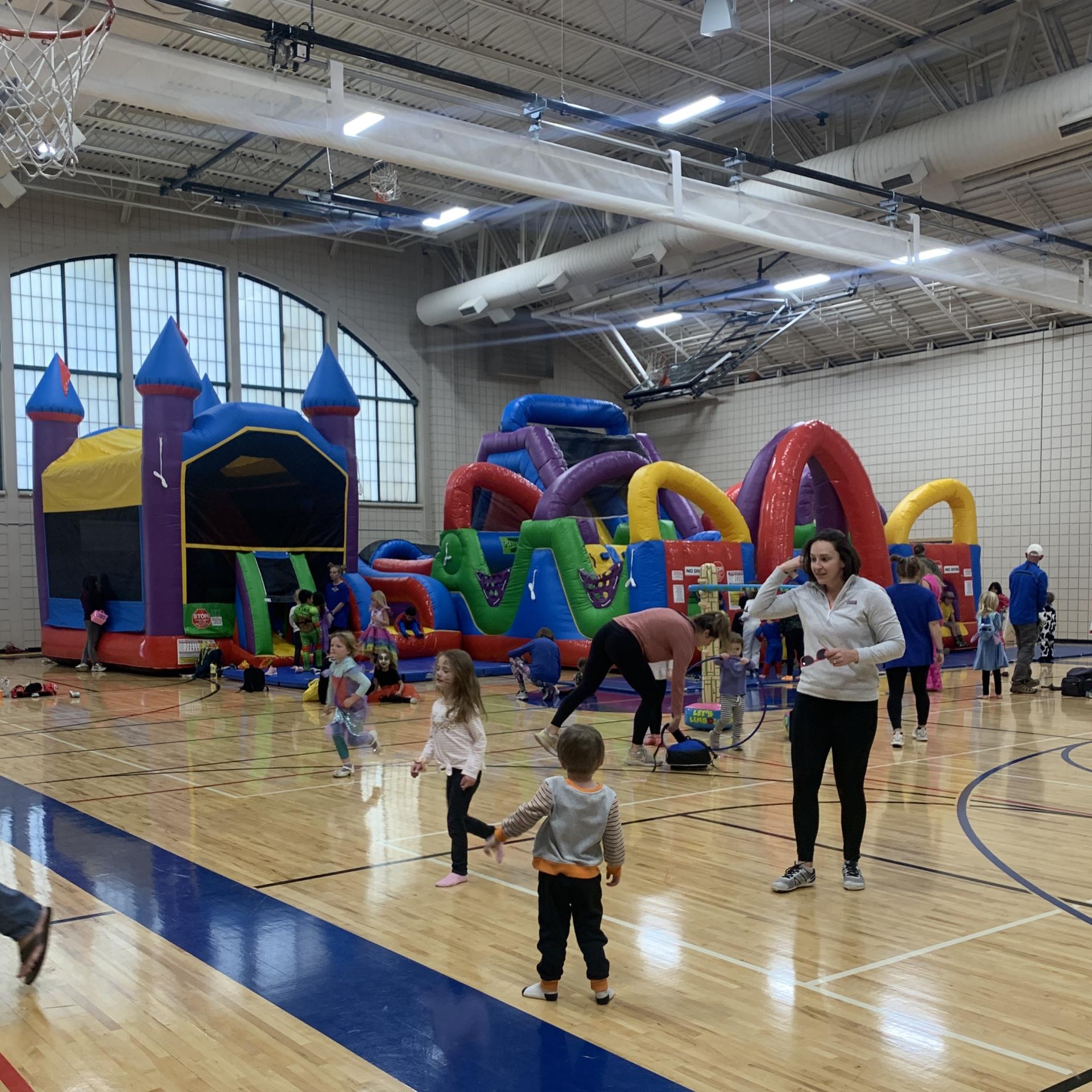 Two bounce houses in gym