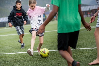 Children playing soccer