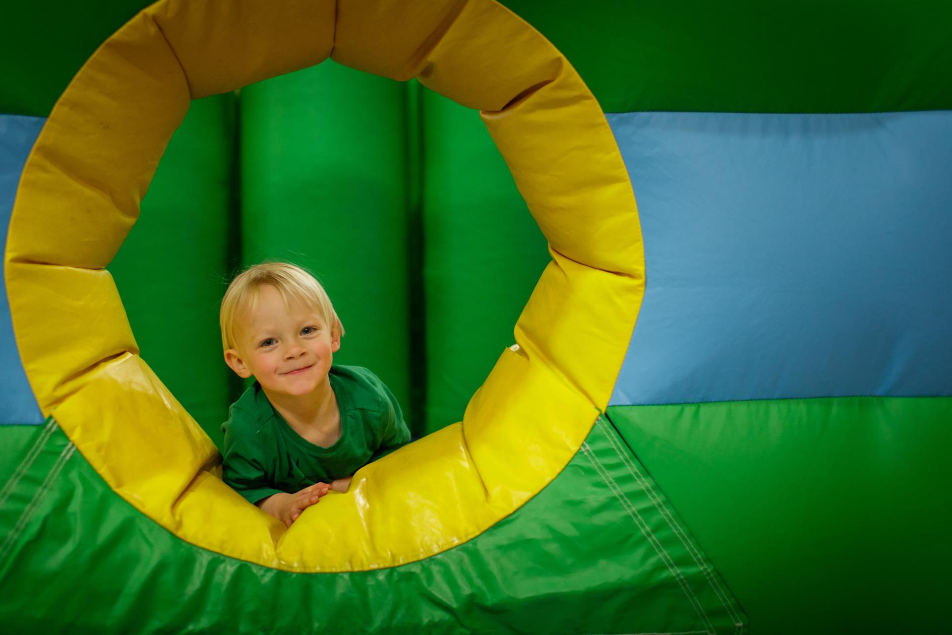 Boy inside inflatable